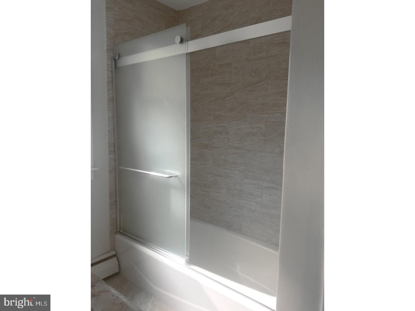 116 Bartholomew Road Berwyn, PA 19312 - Photo 11 of 24 a bathroom with a bathtub