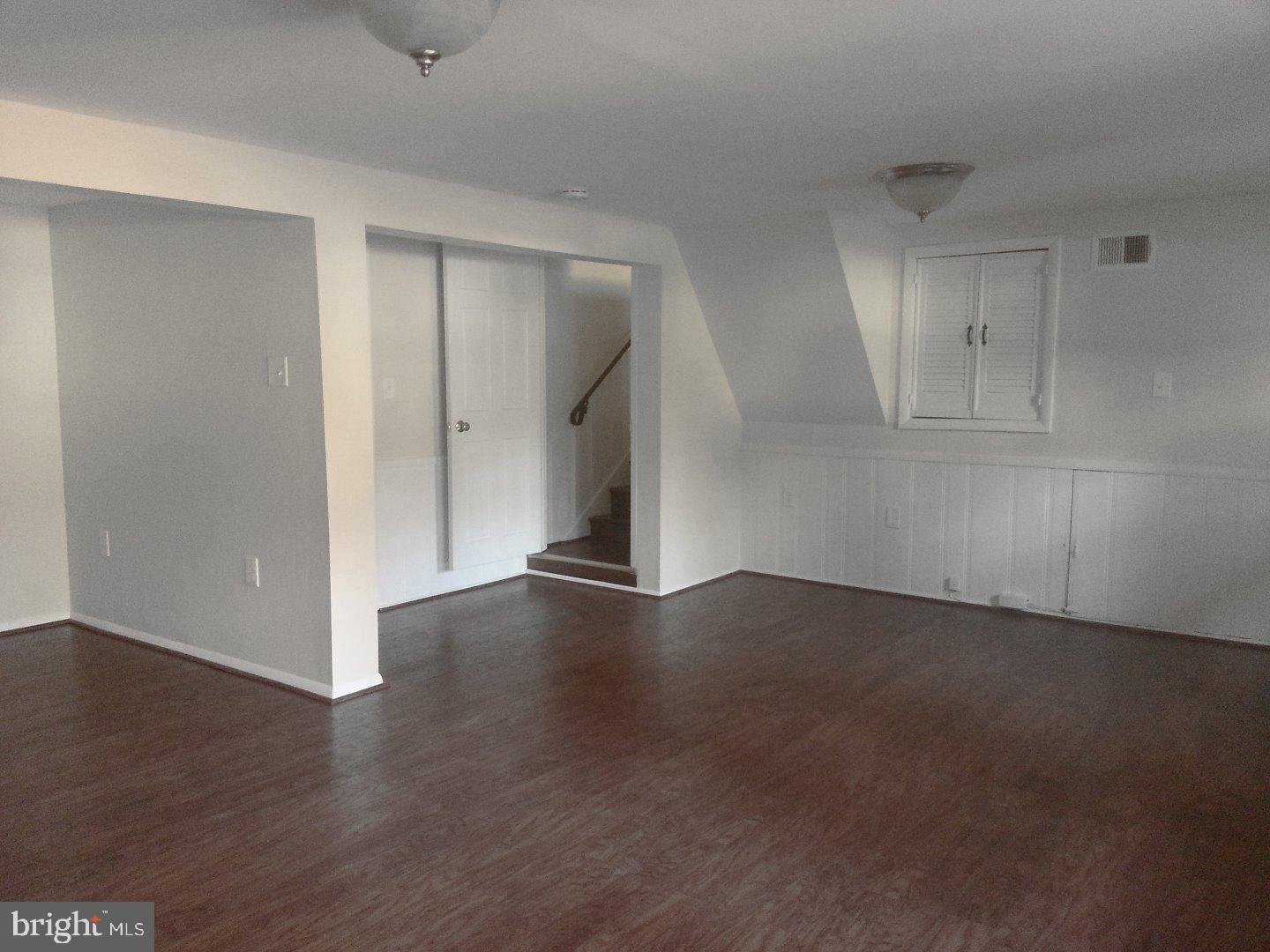 116 Bartholomew Road Berwyn, PA 19312 - Photo 16 of 24 a view of a livingroom with wooden floor and staircase