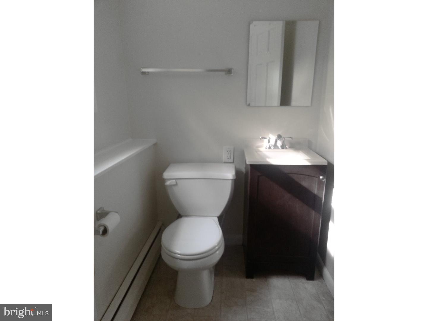 116 Bartholomew Road Berwyn, PA 19312 - Photo 17 of 24 a bathroom with a toilet and a vanity