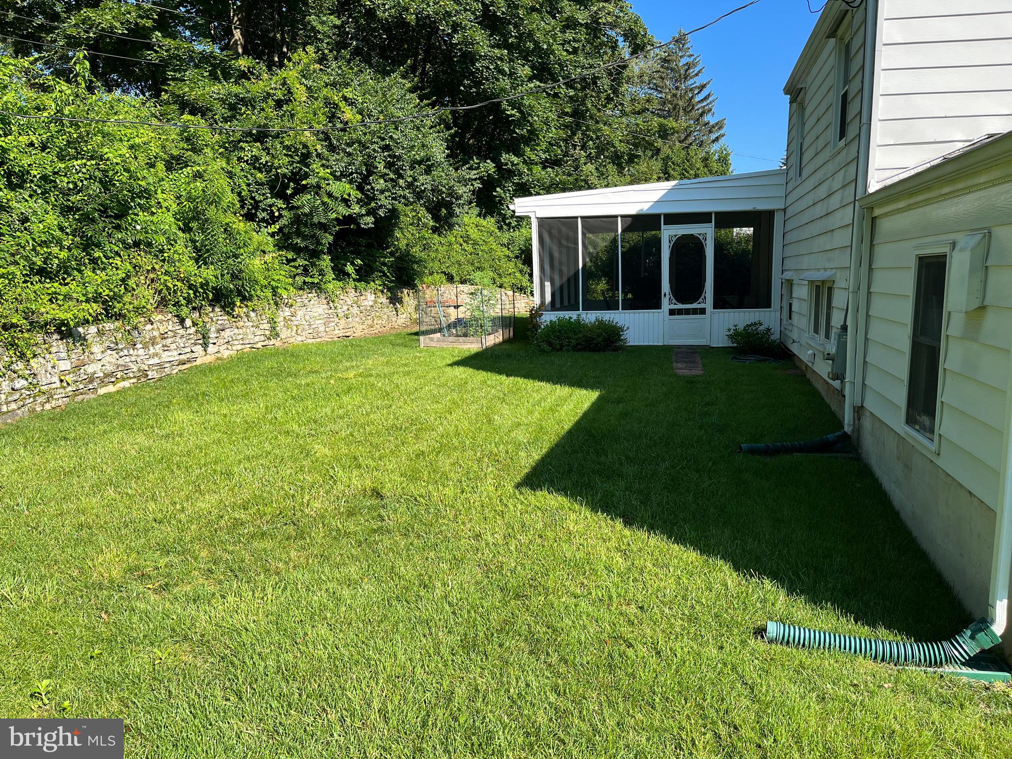 116 Bartholomew Road Berwyn, PA 19312 - Photo 21 of 24 a view of a house with backyard and garden