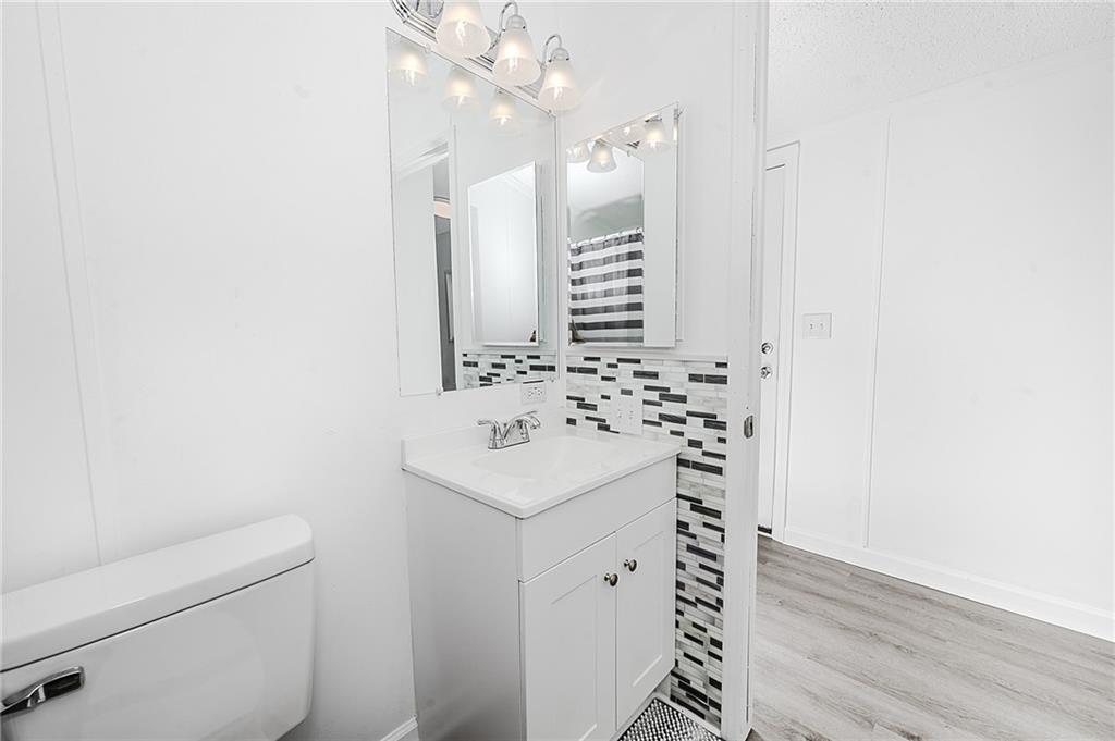 821 Windy Acres Road Saltsburg, PA 15681 - Photo 25 of 31 a bathroom with a sink a vanity and a mirror