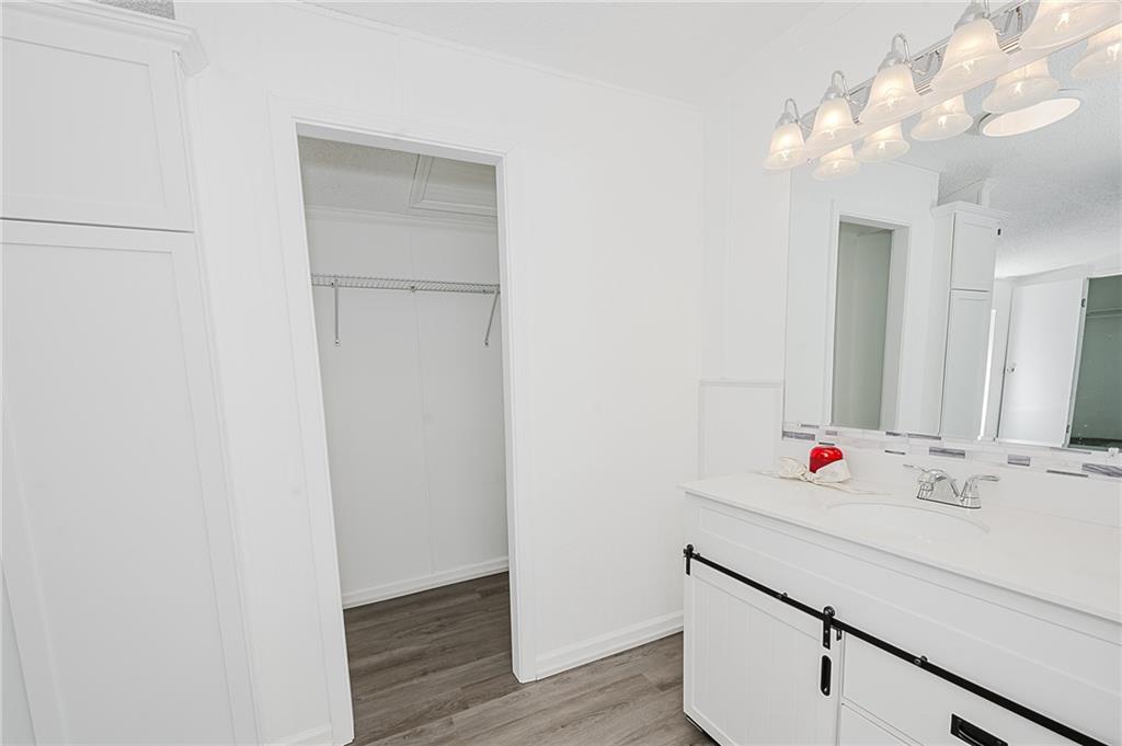821 Windy Acres Road Saltsburg, PA 15681 - Photo 28 of 31 a bathroom with a sink vanity and a mirror