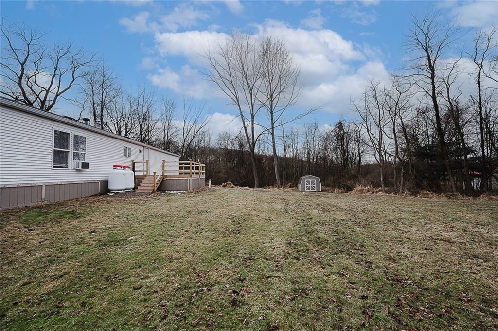 821 Windy Acres Road Saltsburg, PA 15681 - Photo 6 of 31 a view of white house with a yard