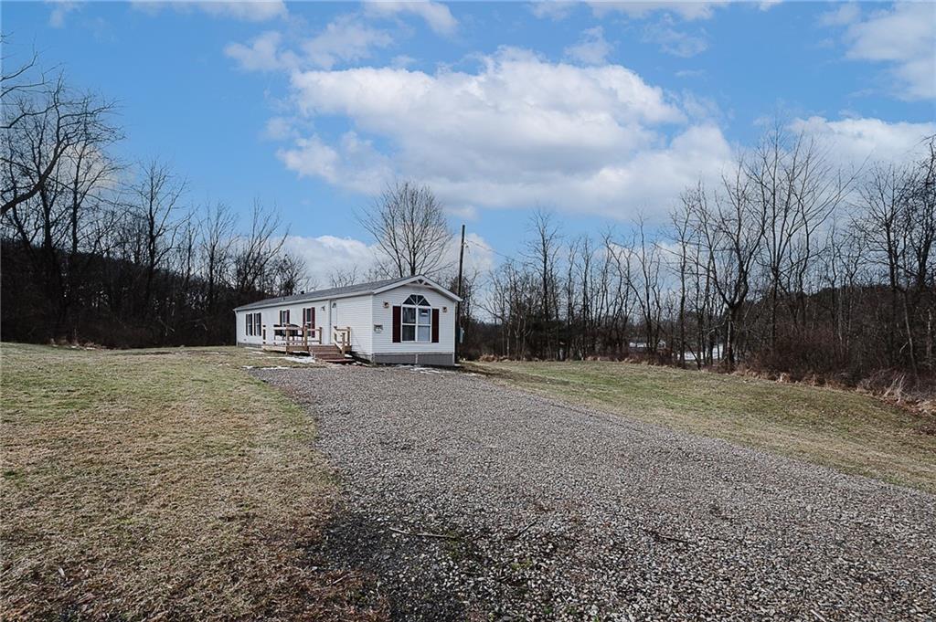 821 Windy Acres Road Saltsburg, PA 15681 - Photo 7 of 31 a view of a large house with a yard