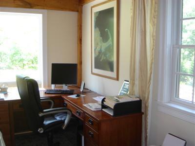 71 Upland Circle Brewster, MA 02631 - Photo 14 of 29 a view of a workspace with furniture and a window