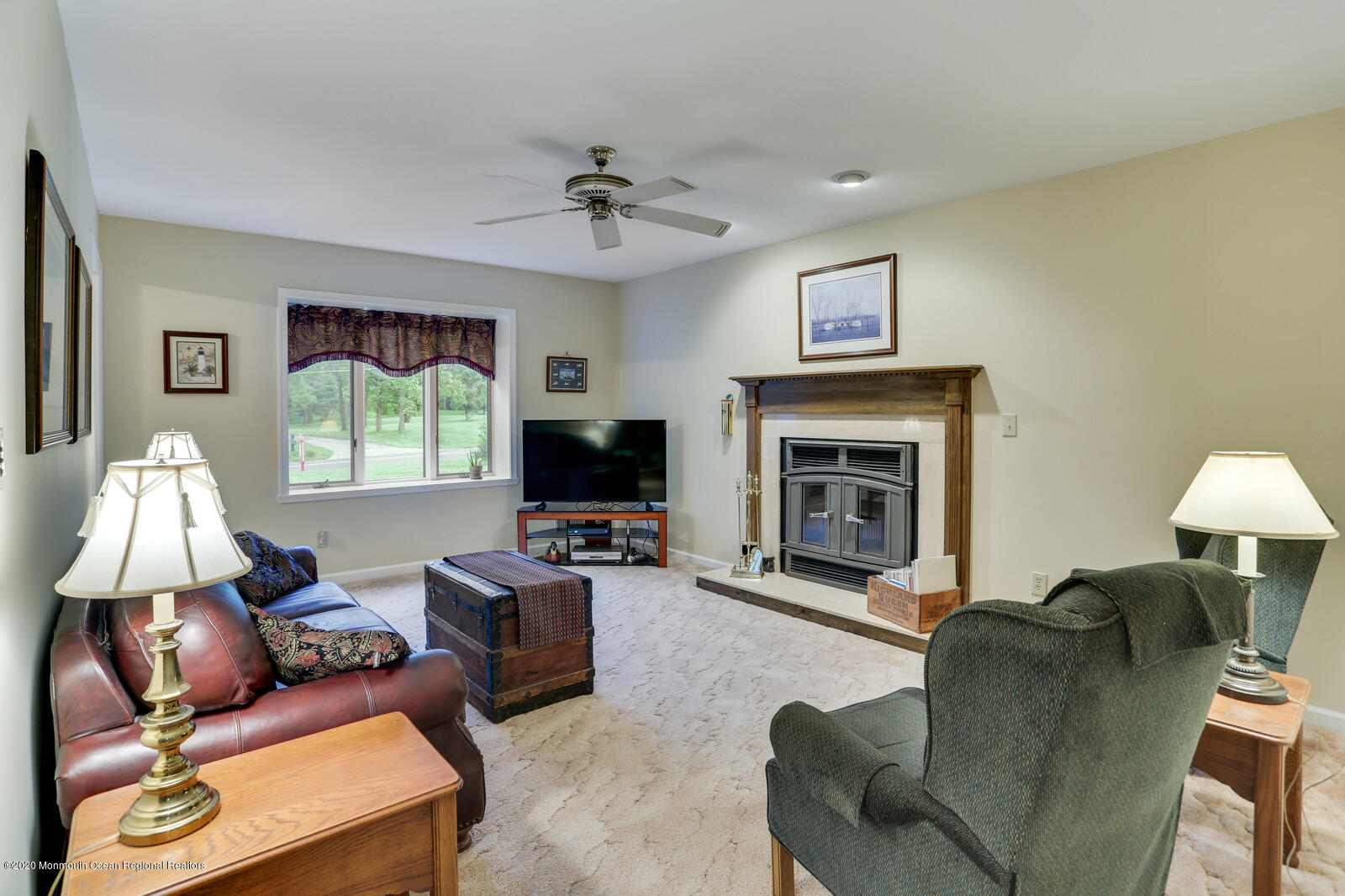 512 Province Line Road Allentown, NJ 08501 - Photo 19 of 38 a living room with furniture a window and a fireplace