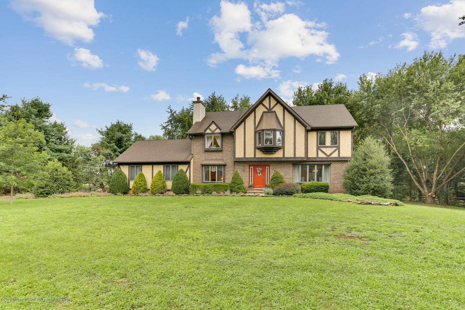 512 Province Line Road Allentown, NJ 08501 - Photo 2 of 38 a front view of a house with a yard and trees