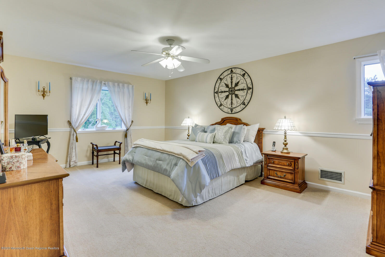 512 Province Line Road Allentown, NJ 08501 - Photo 23 of 38 a bedroom with a bed and a chandelier