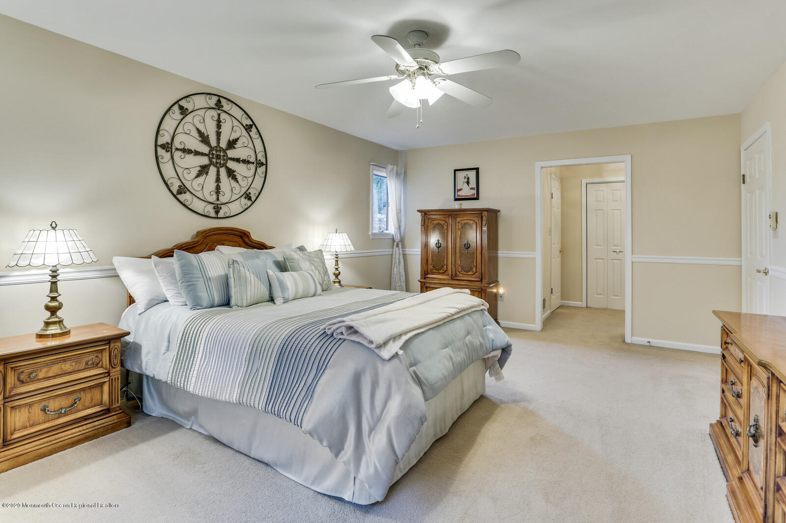 512 Province Line Road Allentown, NJ 08501 - Photo 24 of 38 a spacious bedroom with a bed and a chandelier