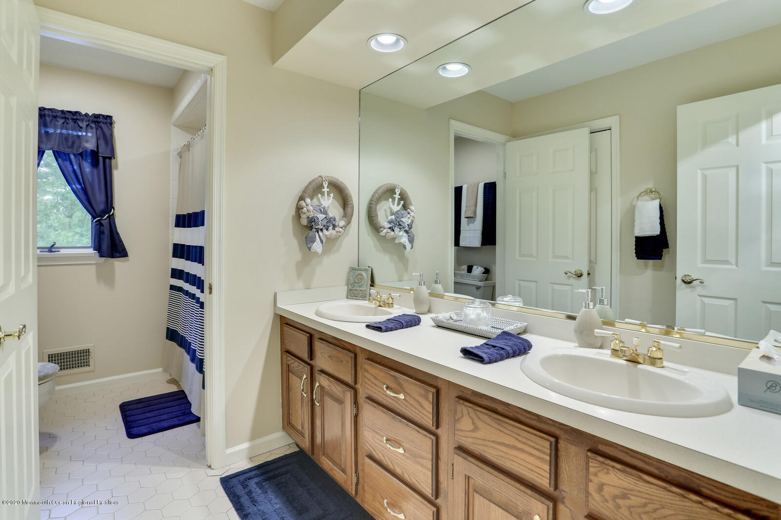 512 Province Line Road Allentown, NJ 08501 - Photo 28 of 38 a bathroom with a sink double vanity and a mirror