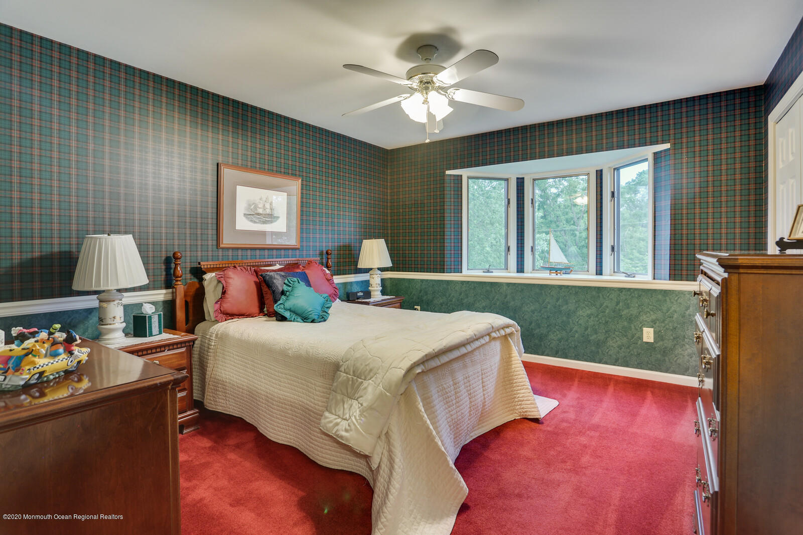 512 Province Line Road Allentown, NJ 08501 - Photo 29 of 38 a bedroom with a bed and a chandelier