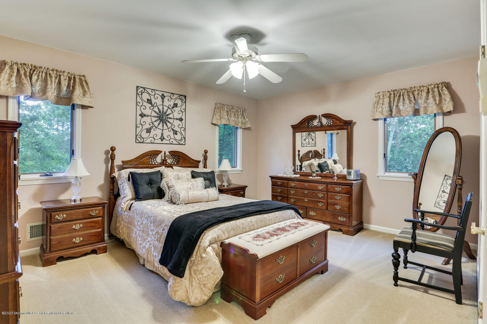 512 Province Line Road Allentown, NJ 08501 - Photo 32 of 38 a bedroom with a bed and a chandelier