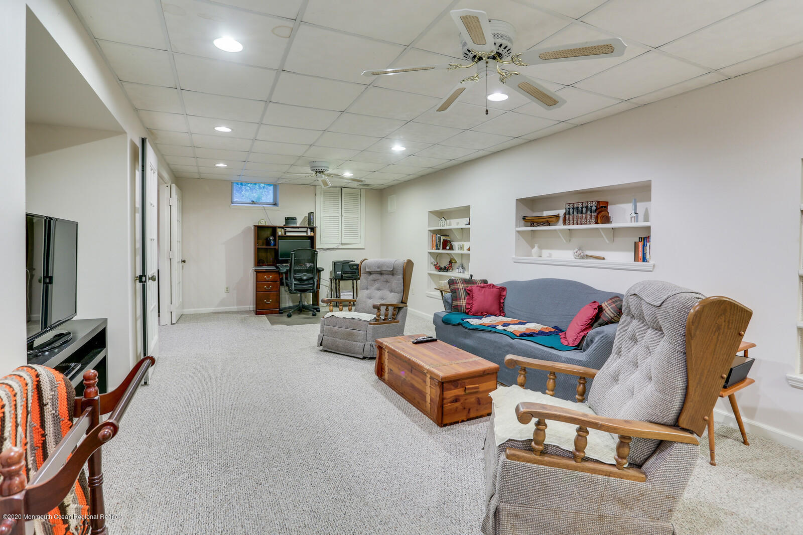 512 Province Line Road Allentown, NJ 08501 - Photo 35 of 38 a living room with furniture and a flat screen tv