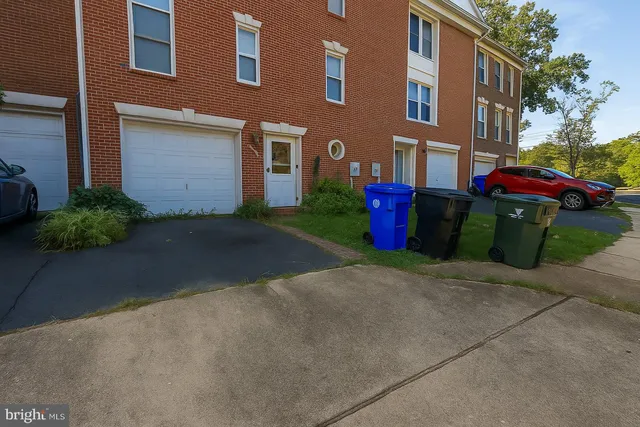 a front view of a house with yard