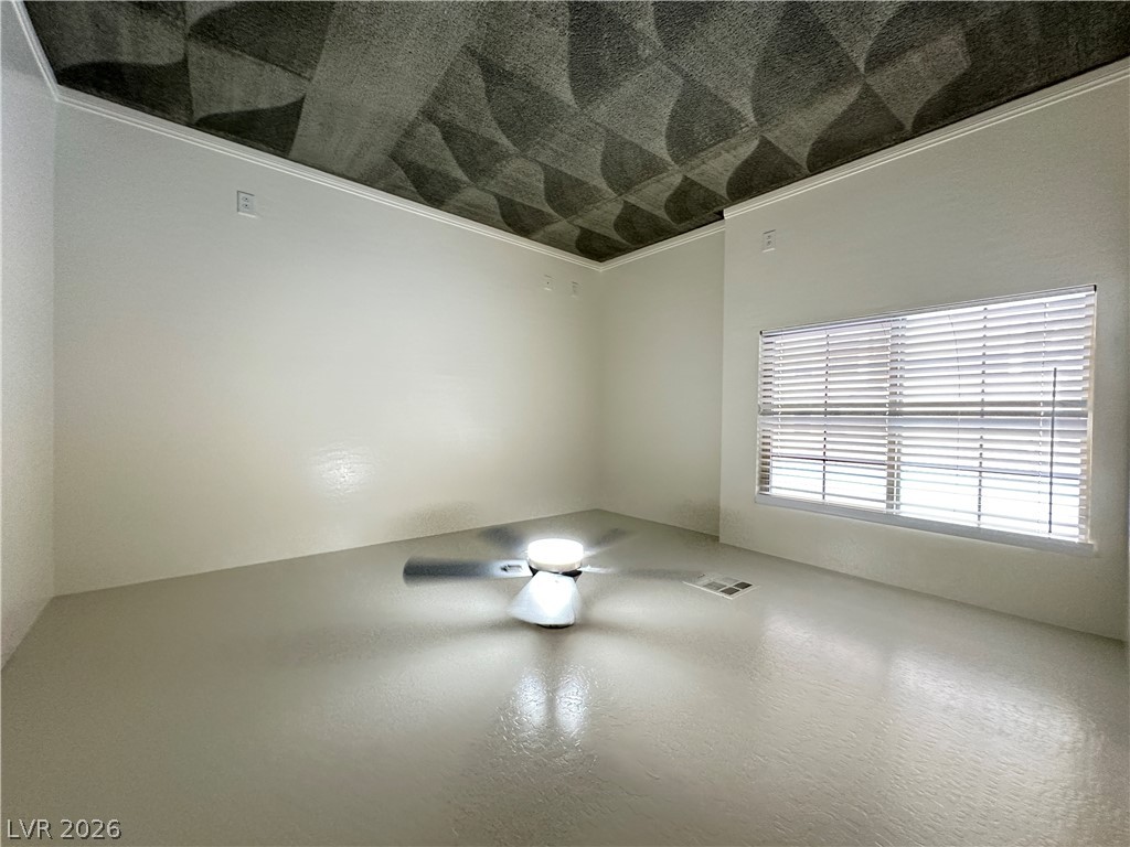 6784 Pivot Point Street Las Vegas, NV 89148 - Photo 13 of 27 A quiet space with a decorative ceiling offers versatility for your personal touches.