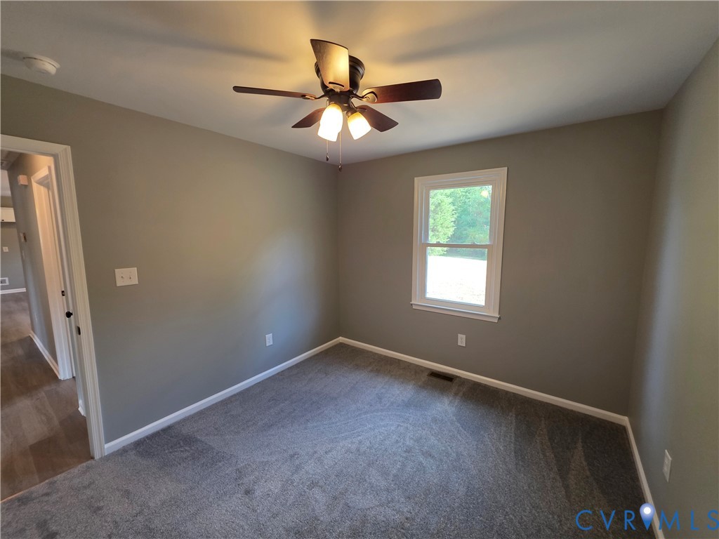 7613 Squirrel Level Road Petersburg, VA 23805 - Photo 27 of 30 Room featuring gray carpeting, neutral wall paint,