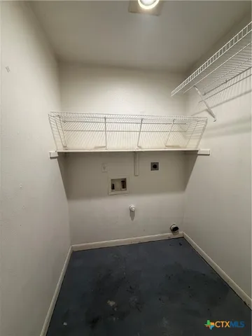 a view of storage and utility room