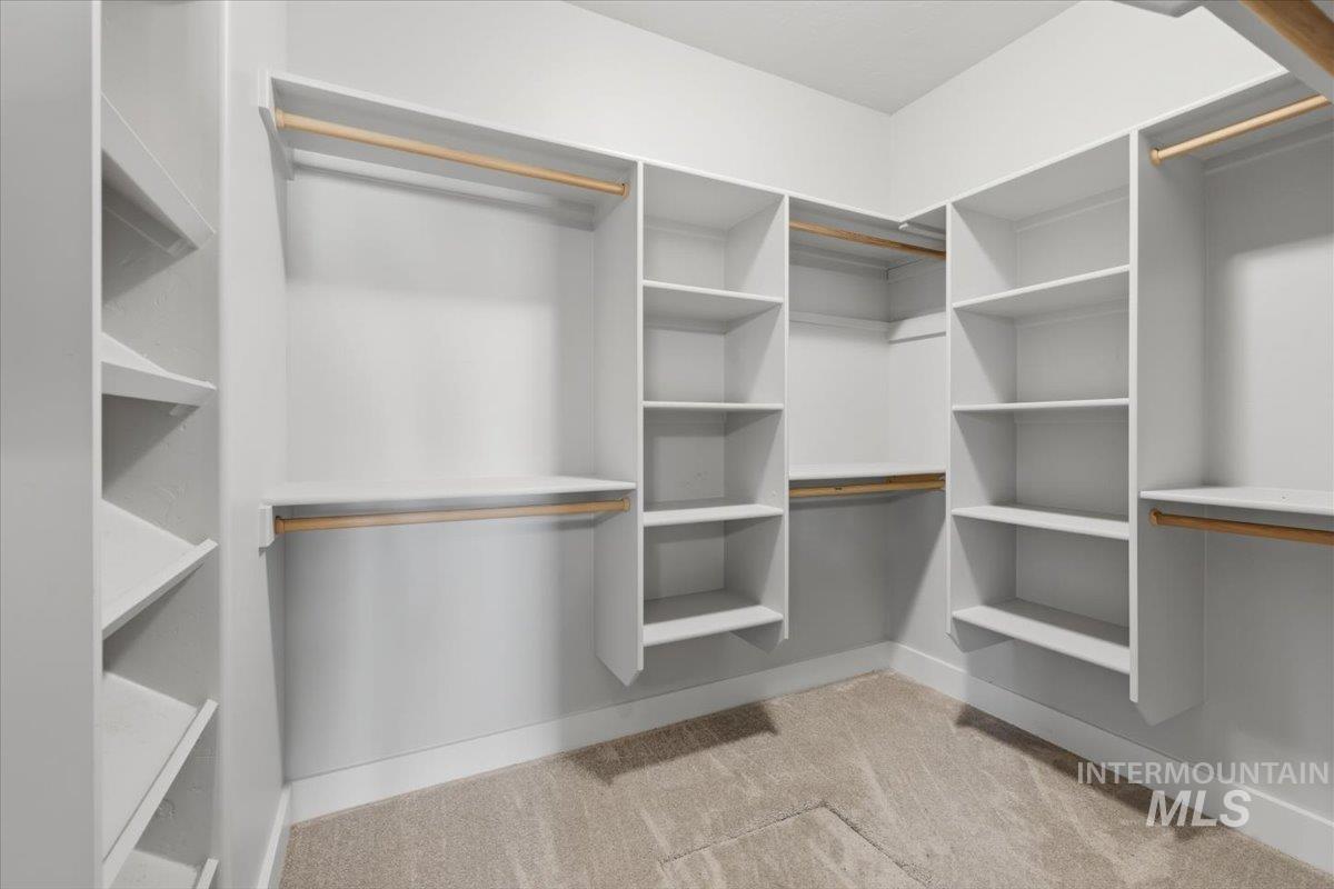 15381 Silver Oak Way Caldwell, ID 83607 - Photo 29 of 48 Walk in closet featuring light colored carpet