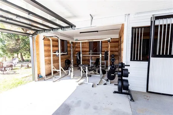 a view of parking garage with furniture