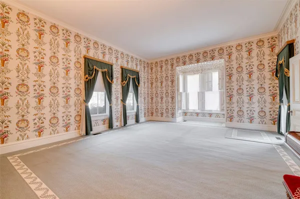 a view of livingroom with furniture and windows