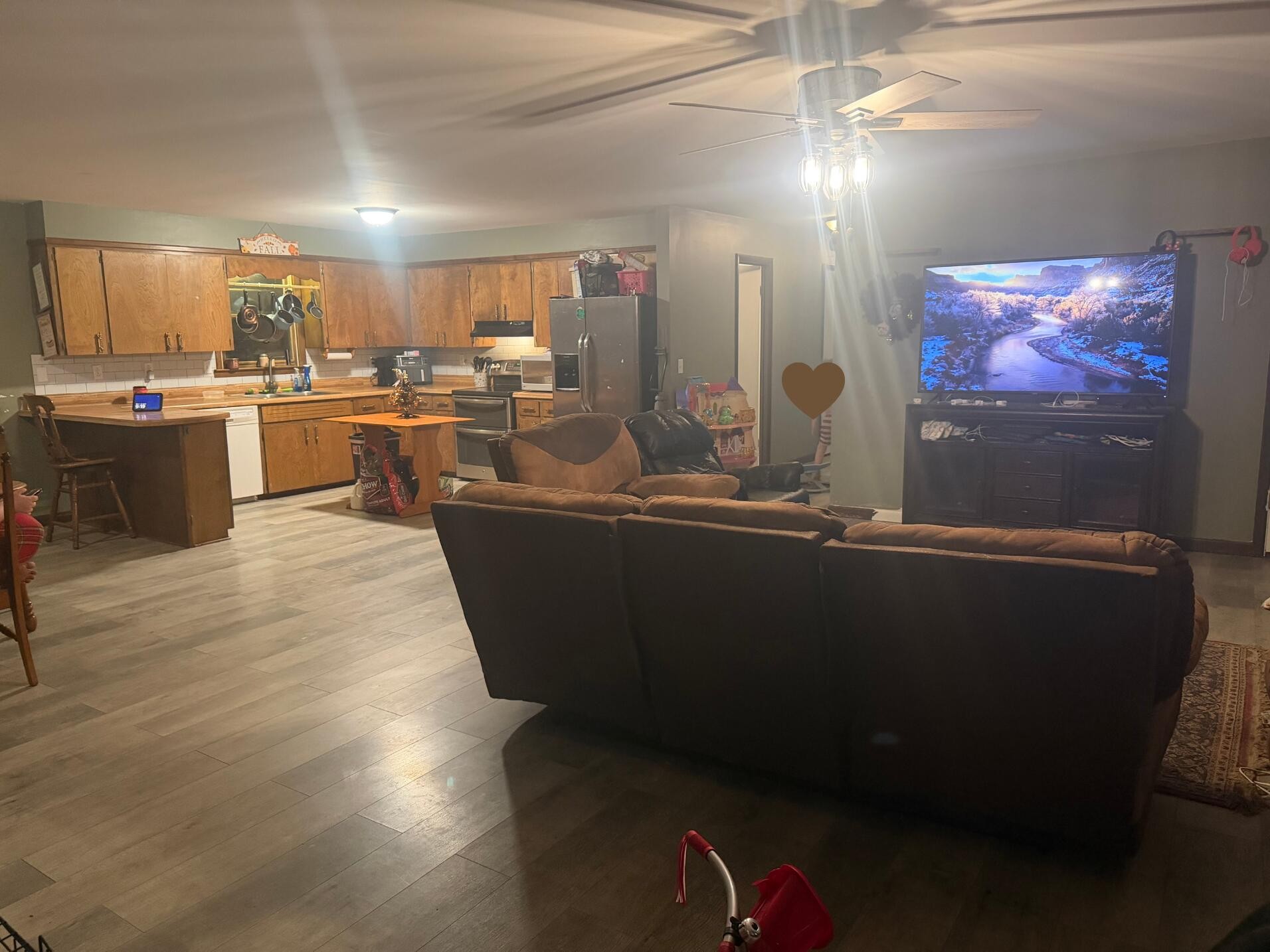 611 Thacker Road Manchester, TN 37355 - Photo 11 of 23 a living room with stainless steel appliances kitchen island granite countertop a couch and a view of kitchen