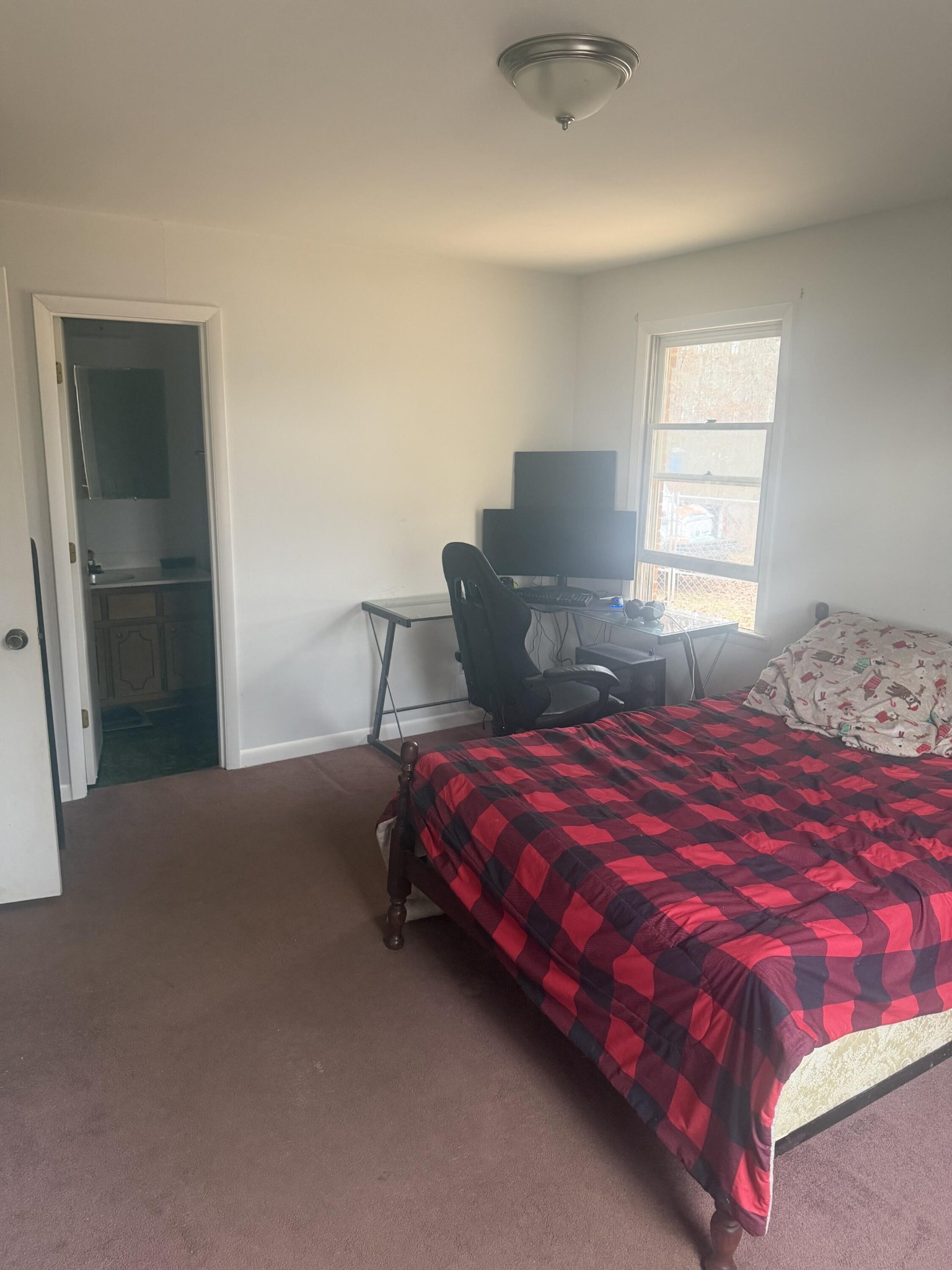 611 Thacker Road Manchester, TN 37355 - Photo 14 of 23 a bedroom with a bed and window