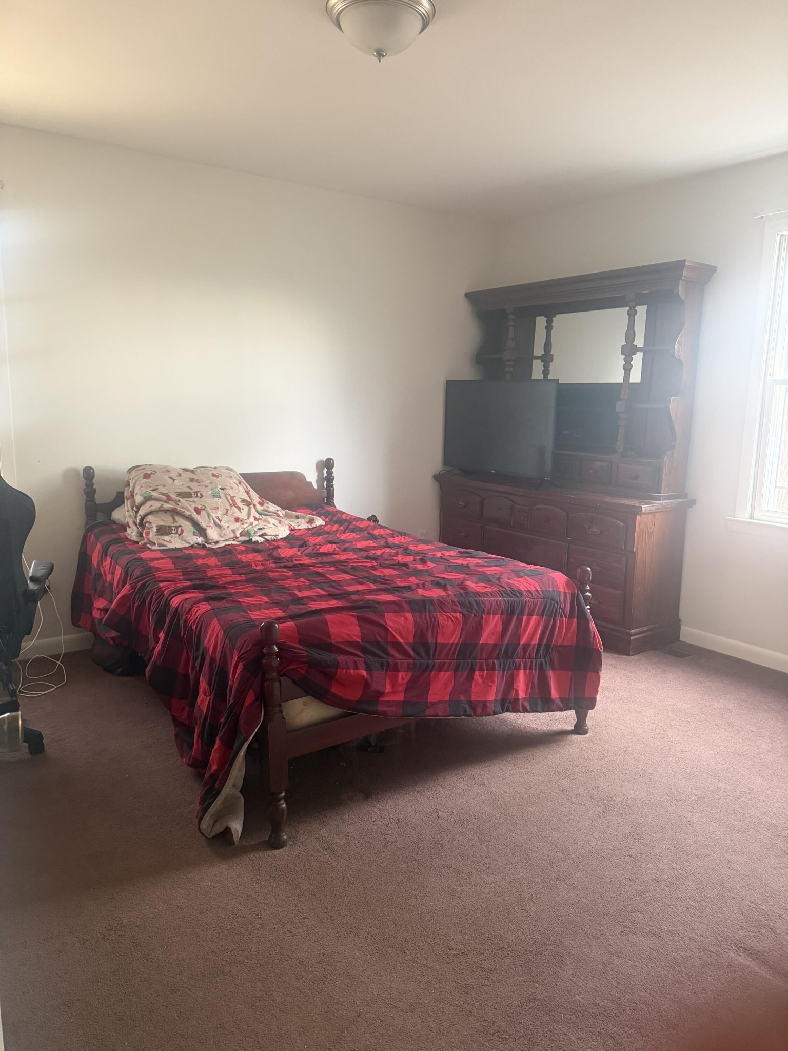 611 Thacker Road Manchester, TN 37355 - Photo 15 of 23 a bedroom with a bed and window