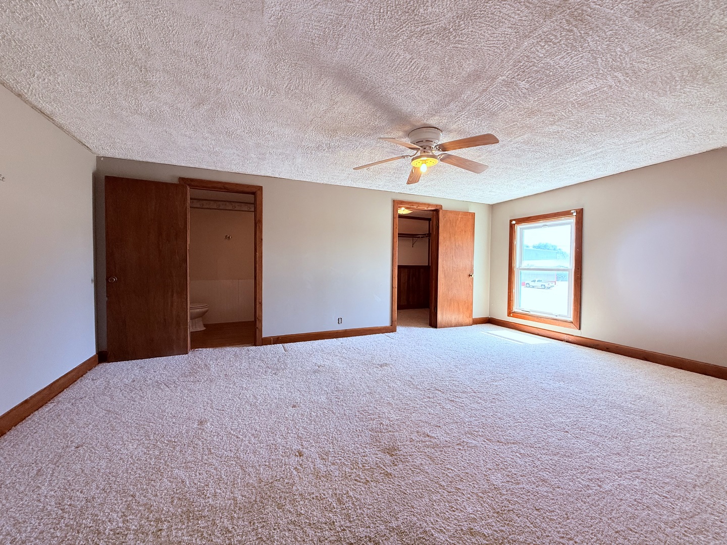 402 North Madison Street Clinton, IL 61727 - Photo 18 of 24 a view of an empty room with a window