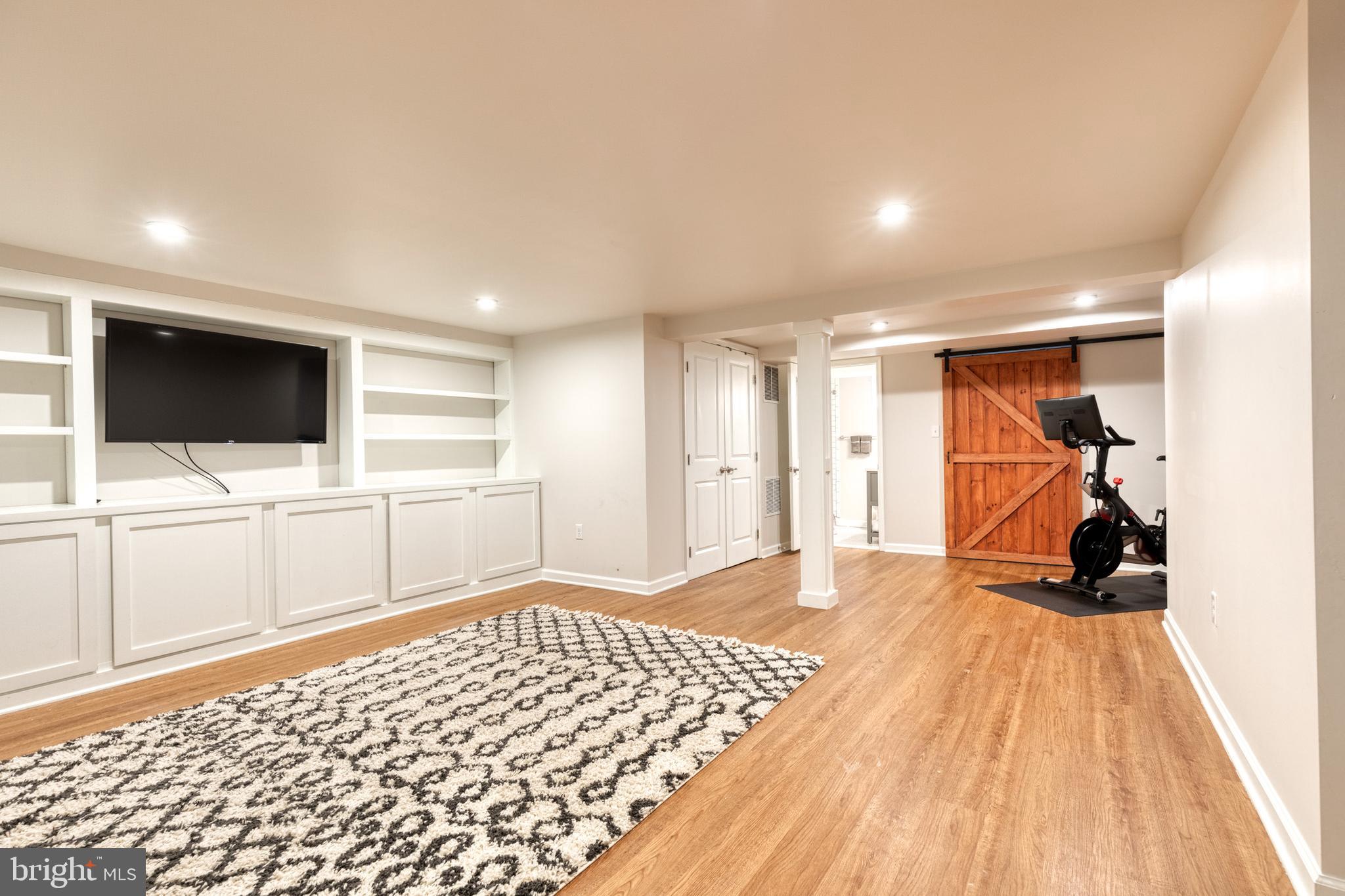 217 Dunkirk Road Baltimore, MD 21212 - Photo 25 of 31 Lower level with recessed lights and built-ins