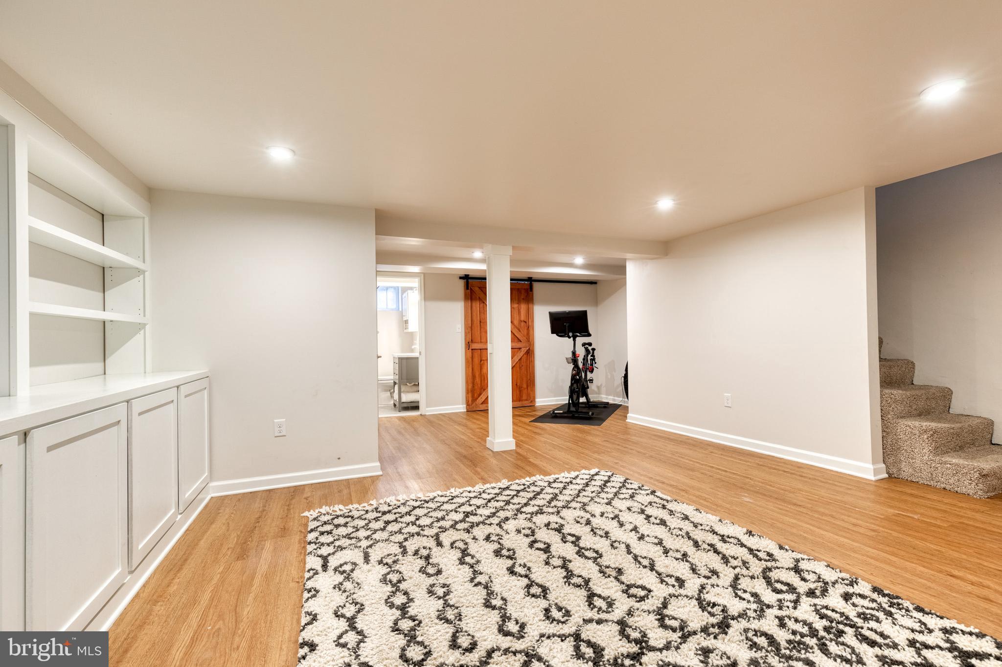217 Dunkirk Road Baltimore, MD 21212 - Photo 6 of 31 Lower level with recessed lights and built-ins