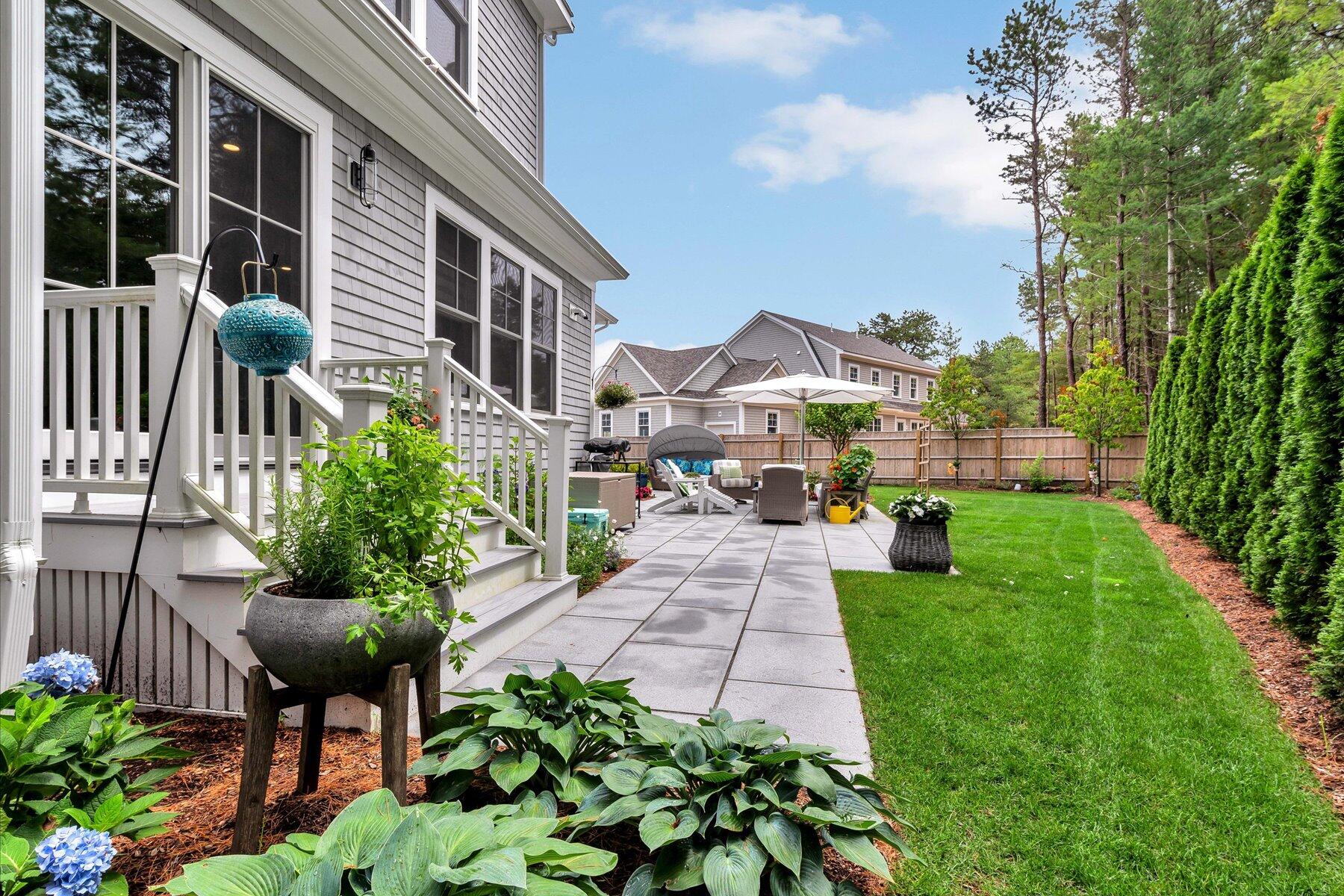 14 Willow Circle Mashpee, MA 02649 - Photo 12 of 60 a view of yard with outdoor seating