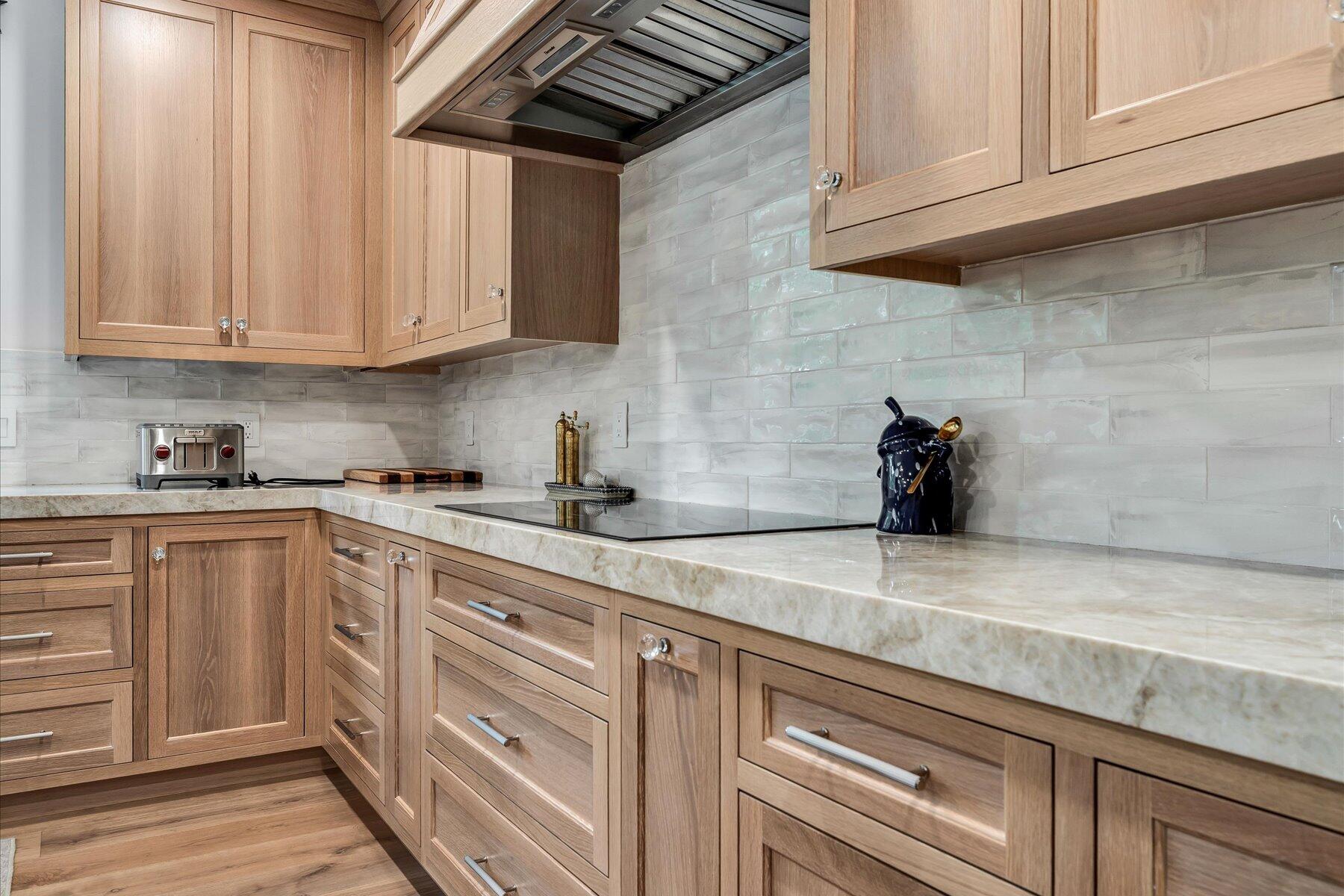 14 Willow Circle Mashpee, MA 02649 - Photo 28 of 60 a kitchen with granite countertop white cabinets and white appliances