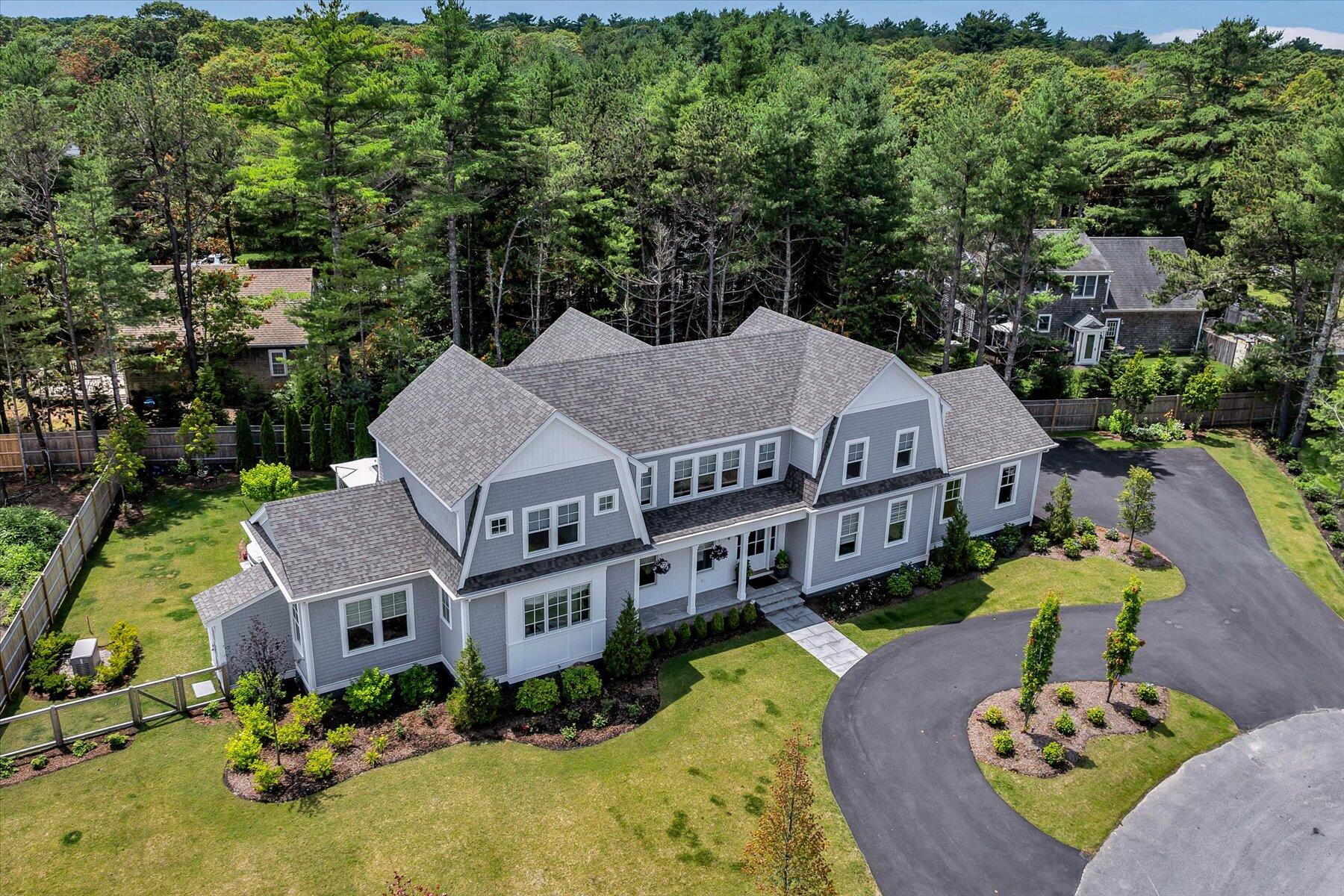 14 Willow Circle Mashpee, MA 02649 - Photo 3 of 60 an aerial view of a house with swimming pool a yard and a patio