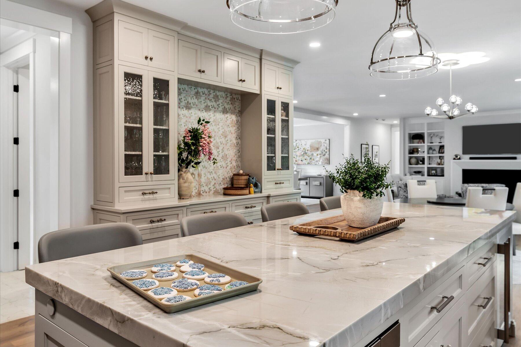 14 Willow Circle Mashpee, MA 02649 - Photo 31 of 60 a kitchen with a table and chairs in it