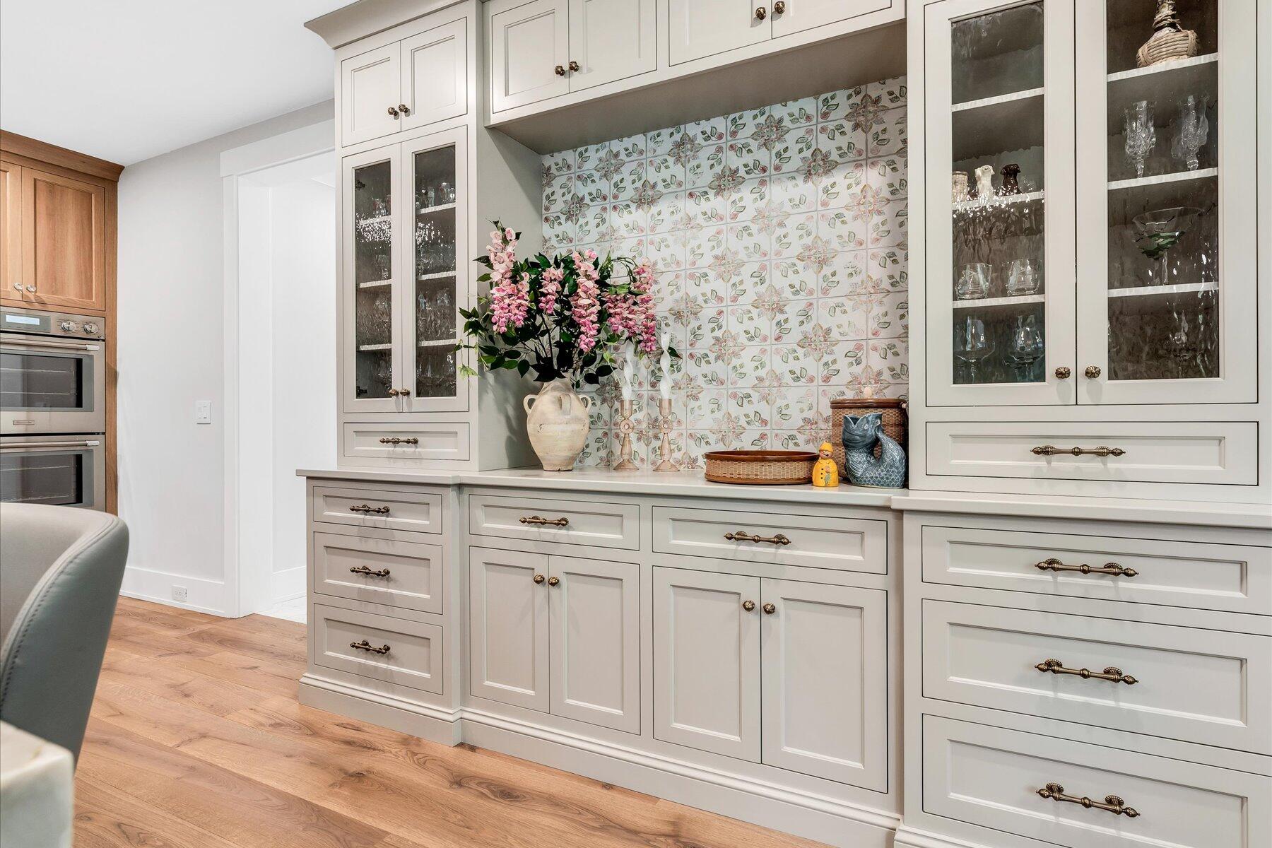 14 Willow Circle Mashpee, MA 02649 - Photo 32 of 60 a view of cabinets a wooden floor and potted plant