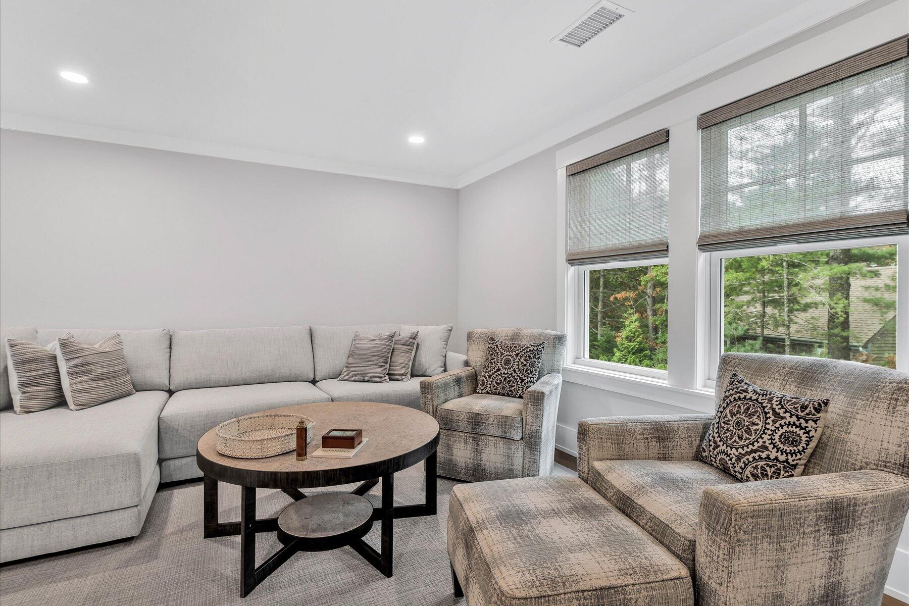 14 Willow Circle Mashpee, MA 02649 - Photo 51 of 60 a living room with furniture and a table