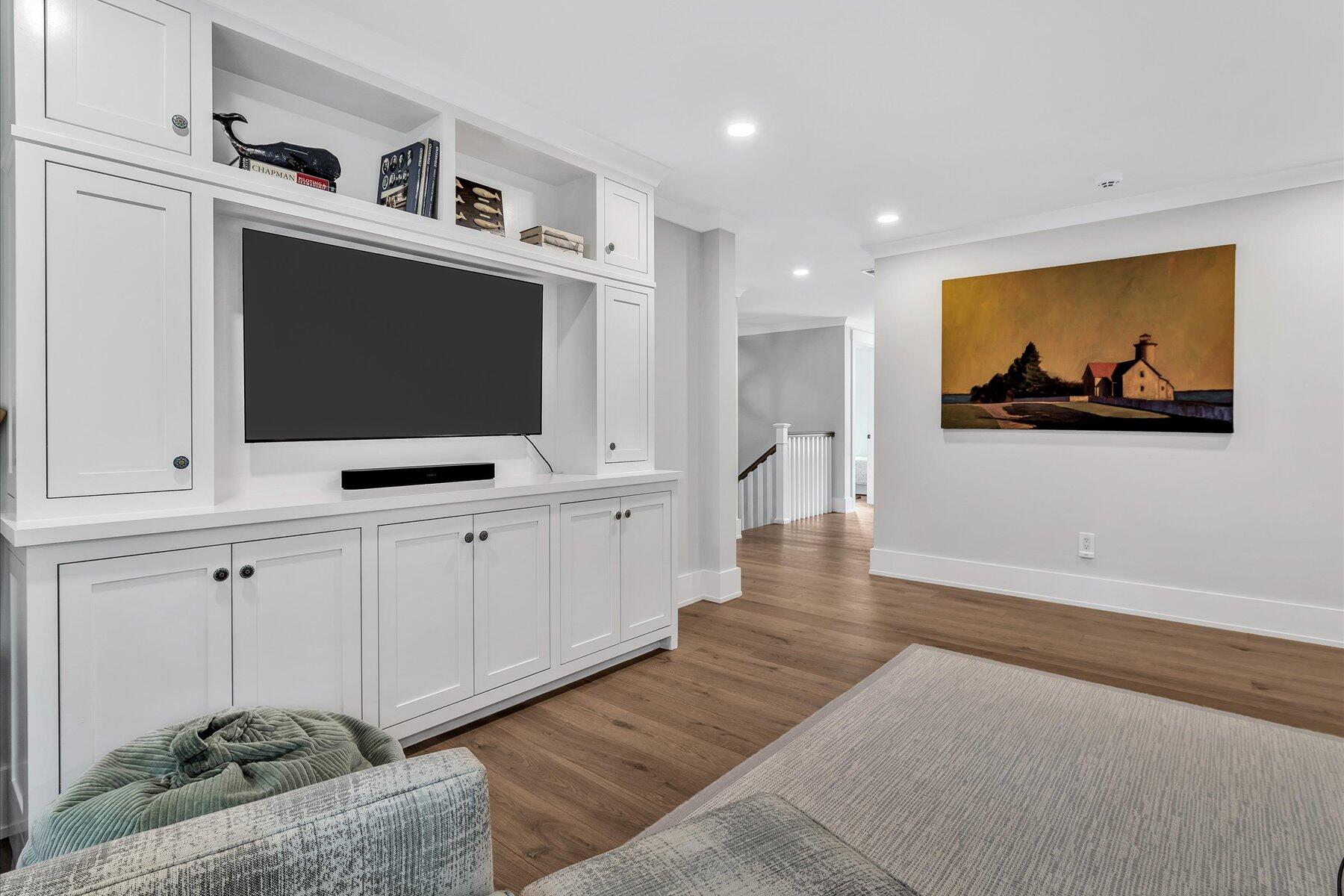 14 Willow Circle Mashpee, MA 02649 - Photo 52 of 60 a living room with furniture and a flat screen tv
