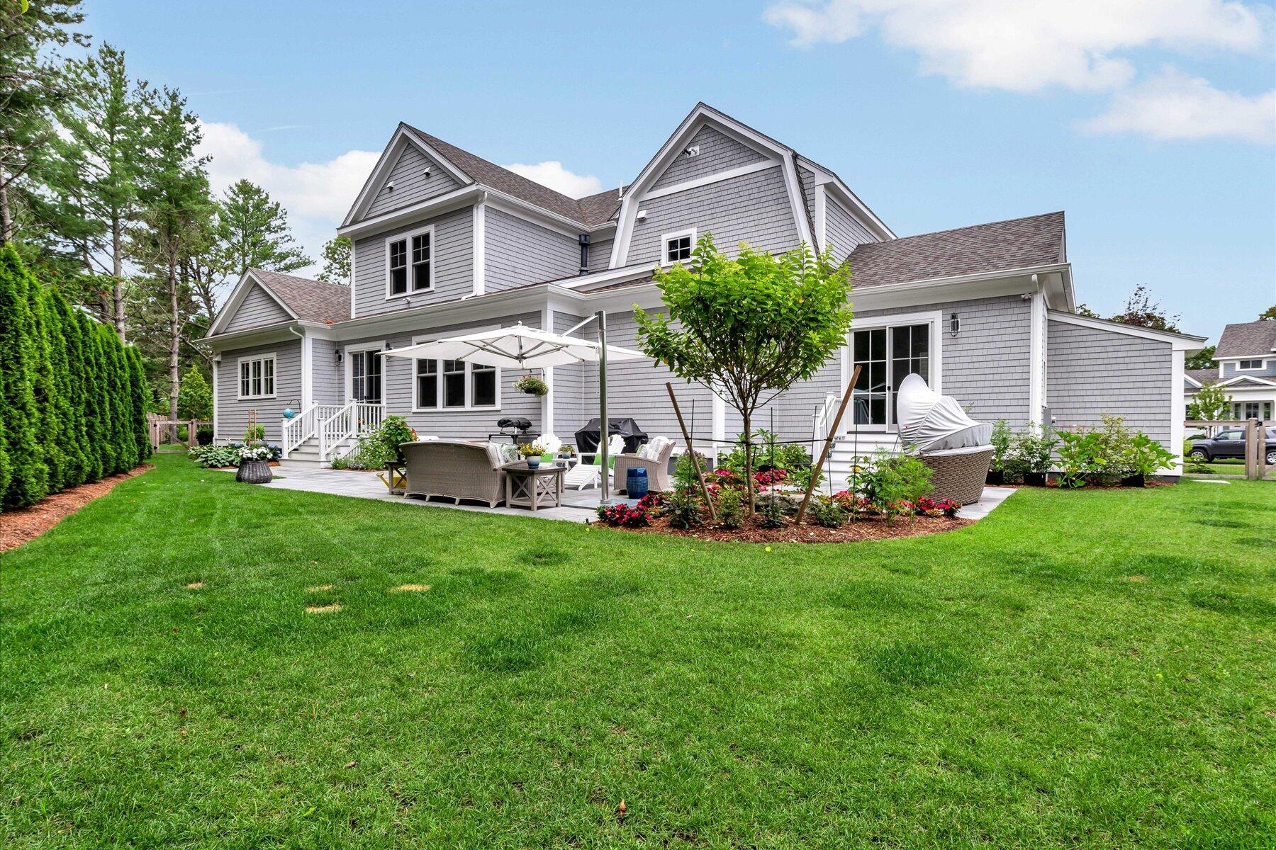 14 Willow Circle Mashpee, MA 02649 - Photo 8 of 60 a front view of house with yard and green space