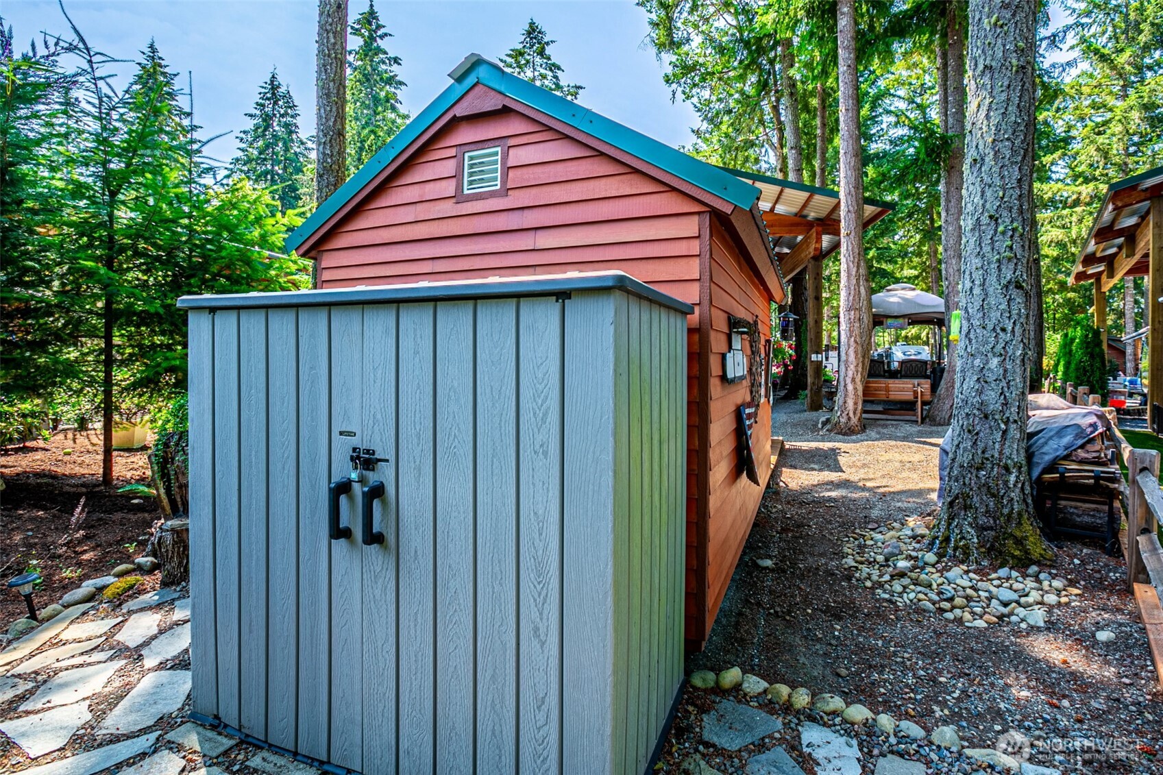 1546 Reservation Road Southeast, Unit 253 Olympia, WA 98513 - Photo 14 of 31 a backyard of a house with seating space