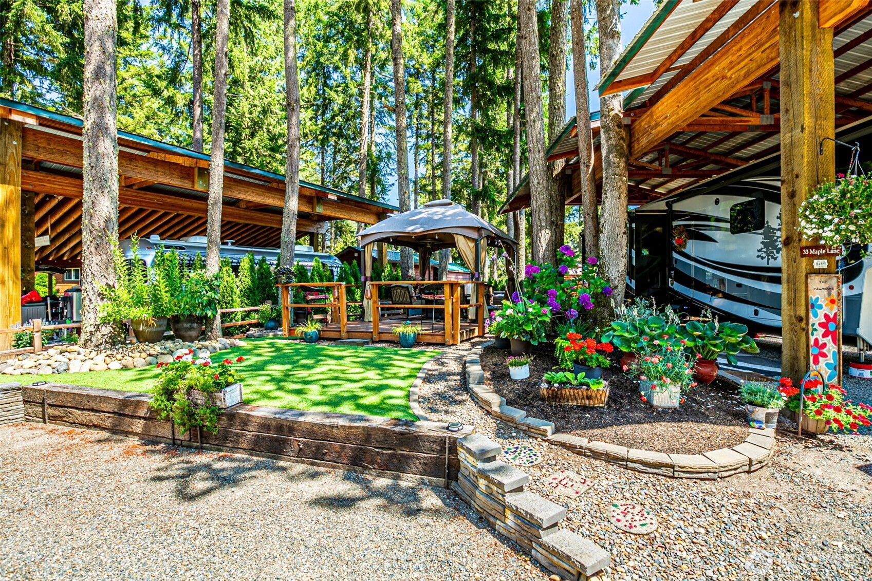 1546 Reservation Road Southeast, Unit 253 Olympia, WA 98513 - Photo 20 of 31 a view of a patio with chairs and flower plants