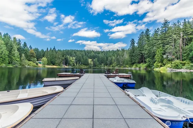 a view of a lake with a yard