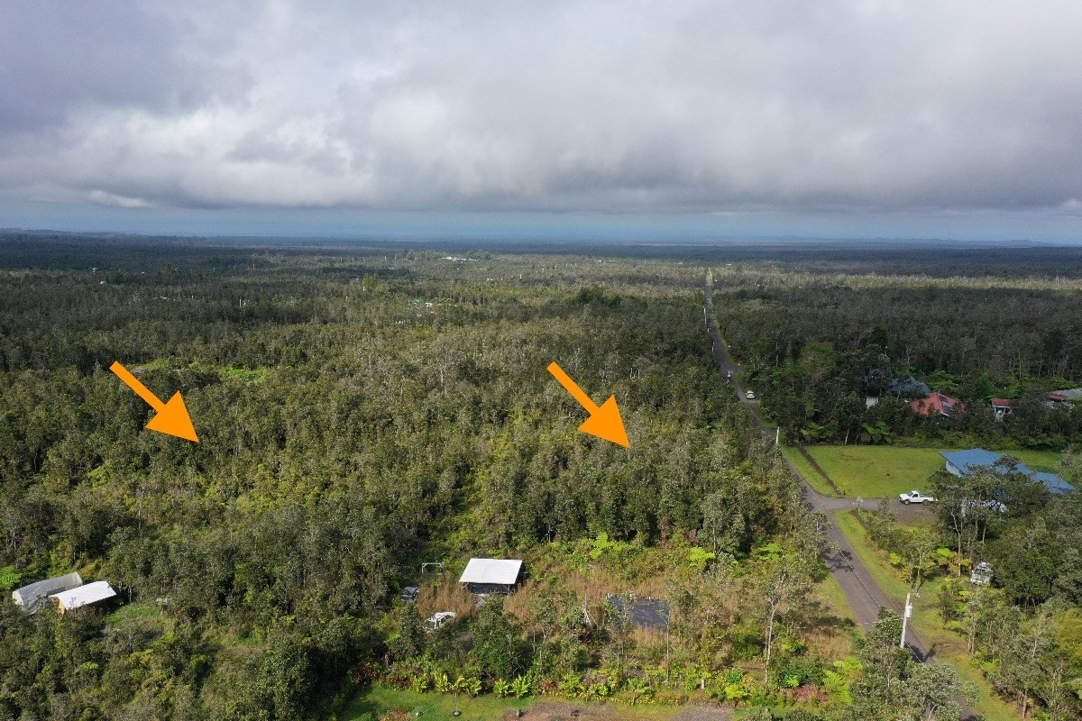 a view of a lake and a yard