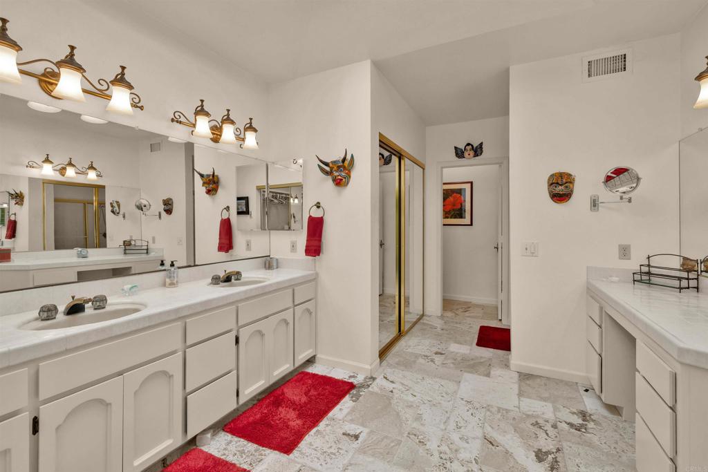 202 Pointing Rock Drive, Unit 4 Borrego Springs, CA 92004 - Photo 11 of 27 a bathroom with a tub sink and mirror