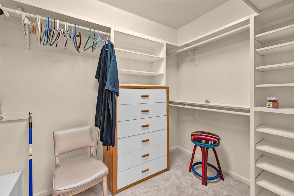 202 Pointing Rock Drive, Unit 4 Borrego Springs, CA 92004 - Photo 12 of 27 a view of walk in closet with clothes and shoes