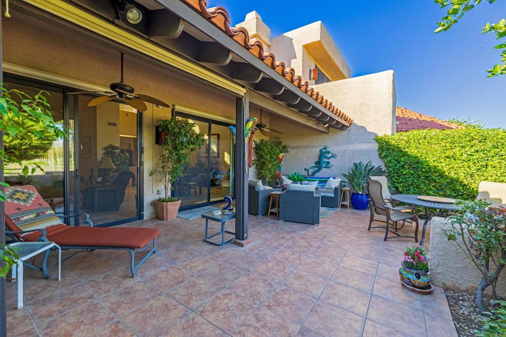 202 Pointing Rock Drive, Unit 4 Borrego Springs, CA 92004 - Photo 19 of 27 a view of a chairs and table in the patio