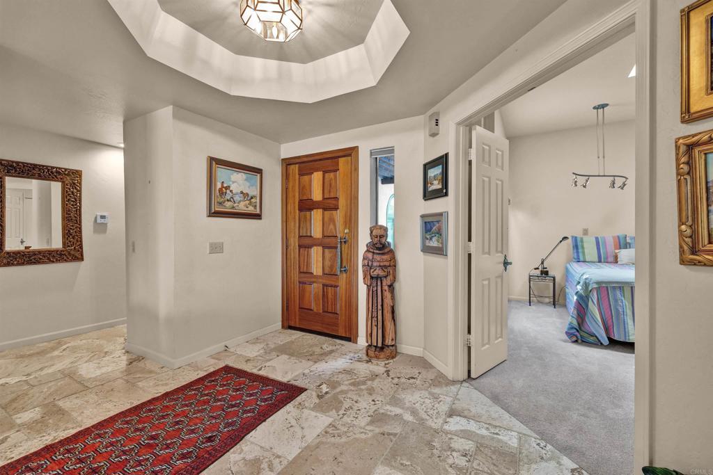 202 Pointing Rock Drive, Unit 4 Borrego Springs, CA 92004 - Photo 2 of 27 a view of a livingroom with furniture and entryway