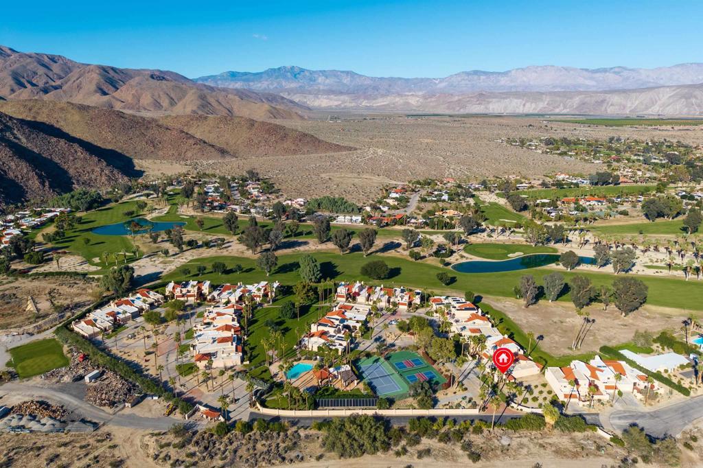 202 Pointing Rock Drive, Unit 4 Borrego Springs, CA 92004 - Photo 24 of 27 a view of a city with mountains in the background