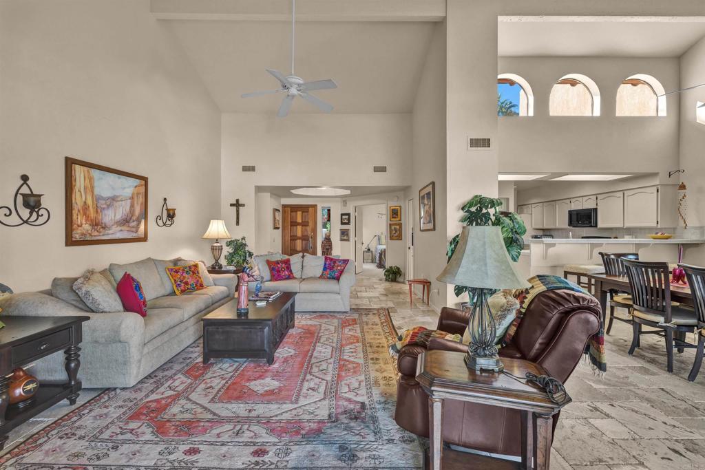 202 Pointing Rock Drive, Unit 4 Borrego Springs, CA 92004 - Photo 4 of 27 a living room with furniture and wooden floor