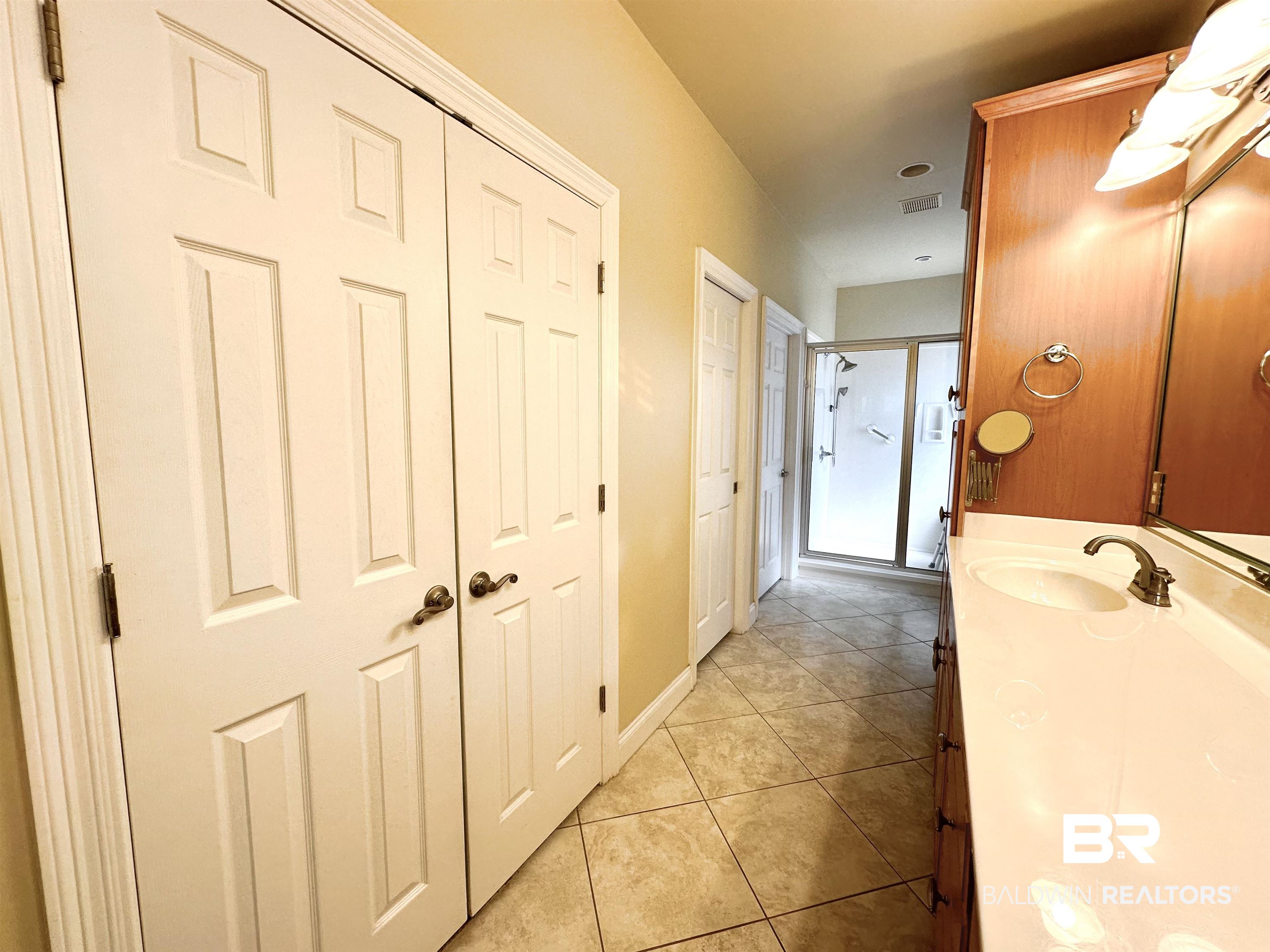 249 Hemingway Loop Foley, AL 36535 - Photo 12 of 33 Interior space featuring sink and light tile patterned floors