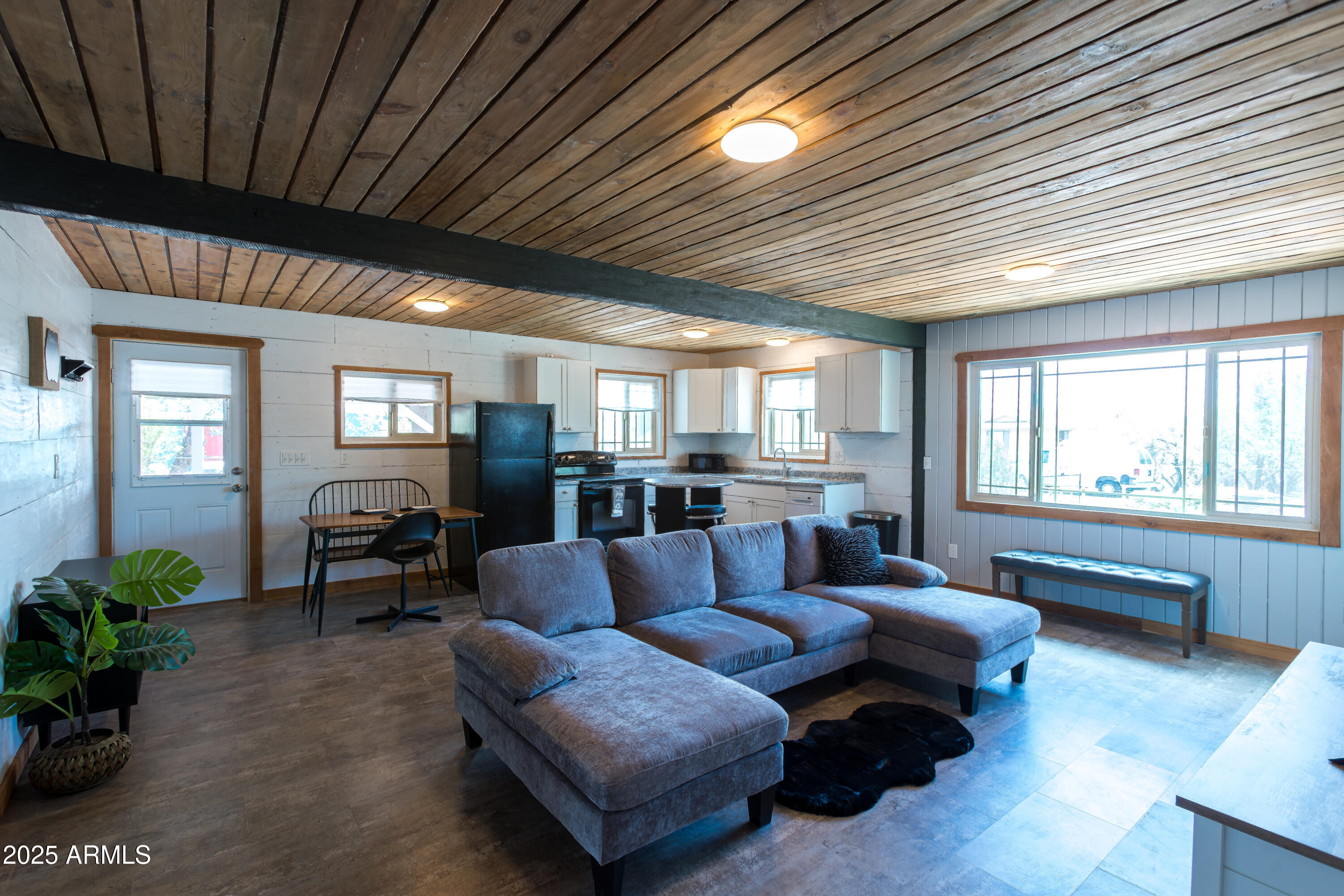 208 Hereford Road Bisbee, AZ 85603 - Photo 11 of 41 a living room with furniture and wooden floors